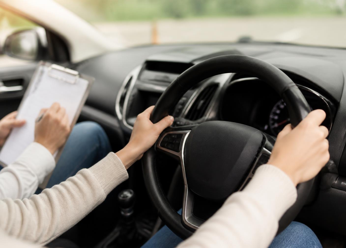 Inside a dual-controlled driving school car